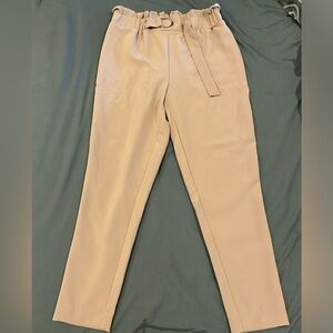 Tan dress pants, size M, adjustable buckle in the front